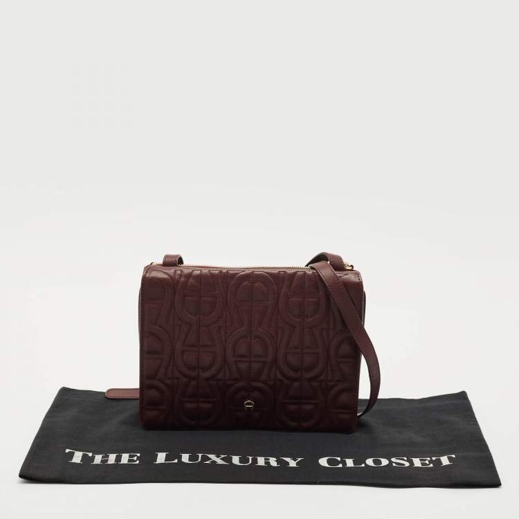 Pre Owned Aigner Burgundy Logo Embossed Leather Flap Crossbody Bag