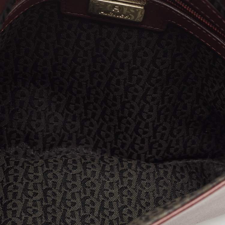Pre Owned Aigner Burgundy Logo Embossed Leather Flap Crossbody Bag