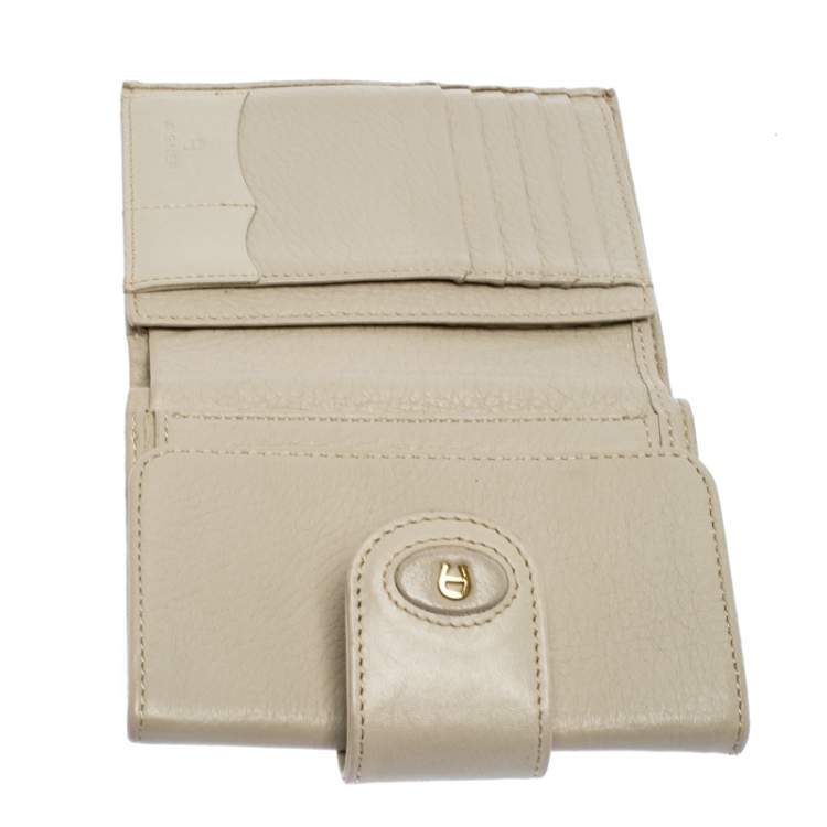 Pre Owned Aigner Ivory Leather Flap Compact Wallet