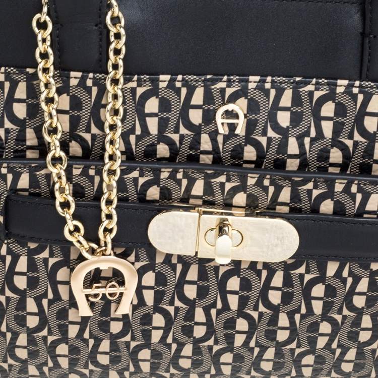 Pre Owned Aigner Black/White Coated Canvas and Leather Turn Lock Satchel