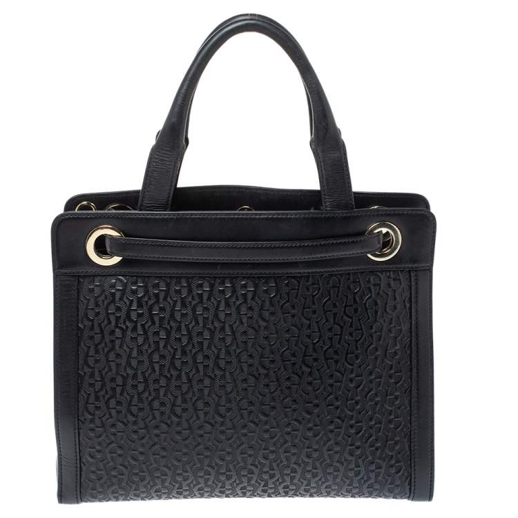 Pre Owned Aigner Dark Blue Signature Embossed Leather Cavallina Tote