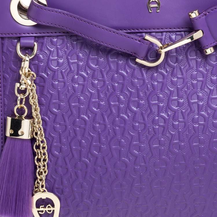 Pre Owned Aigner Purple Logo Embossed Leather Cavallina Tote