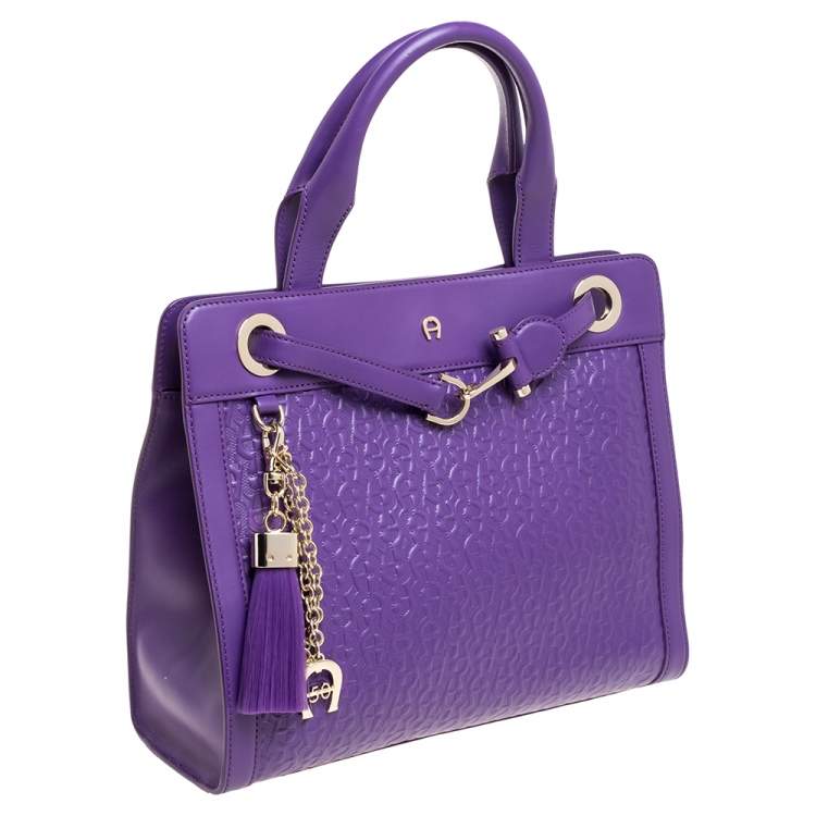 Pre Owned Aigner Purple Logo Embossed Leather Cavallina Tote