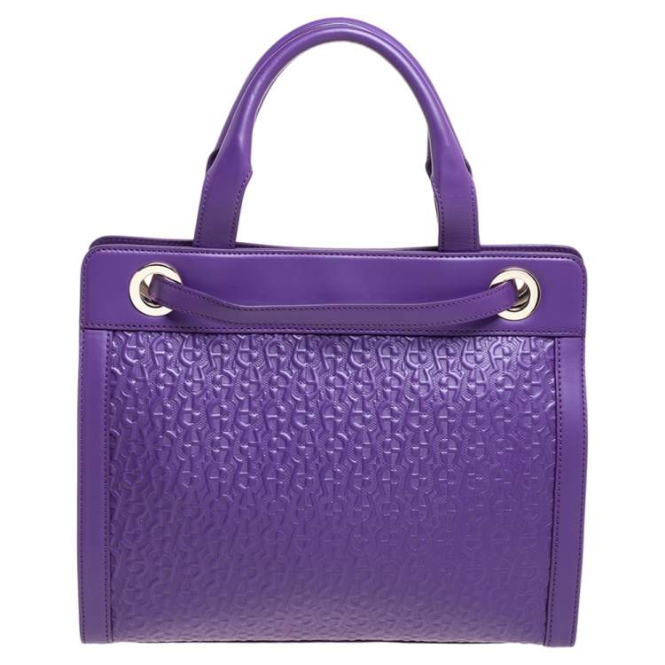 Pre Owned Aigner Purple Logo Embossed Leather Cavallina Tote
