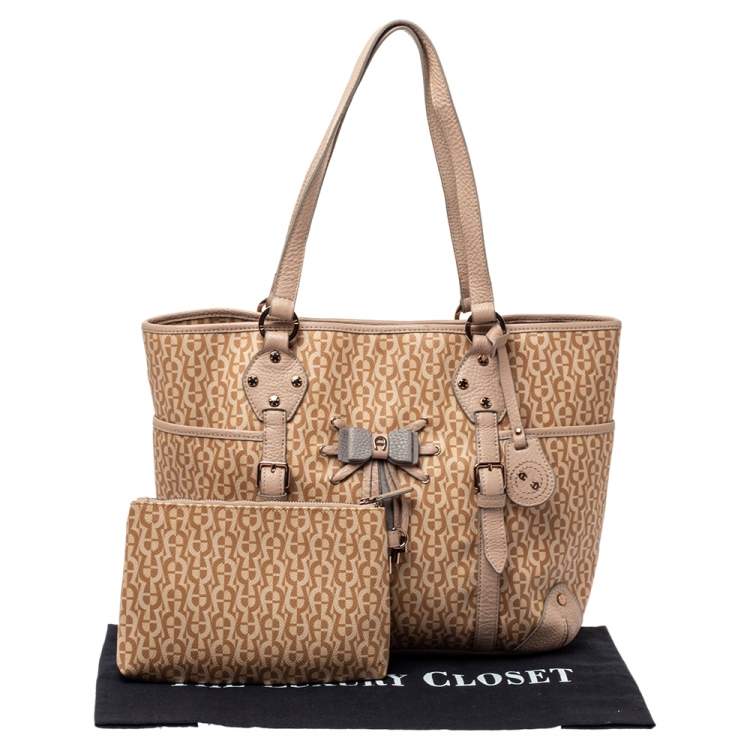 Pre Owned Aigner Beige/Pink Signature Coated Canvas and Leather Bow Tote