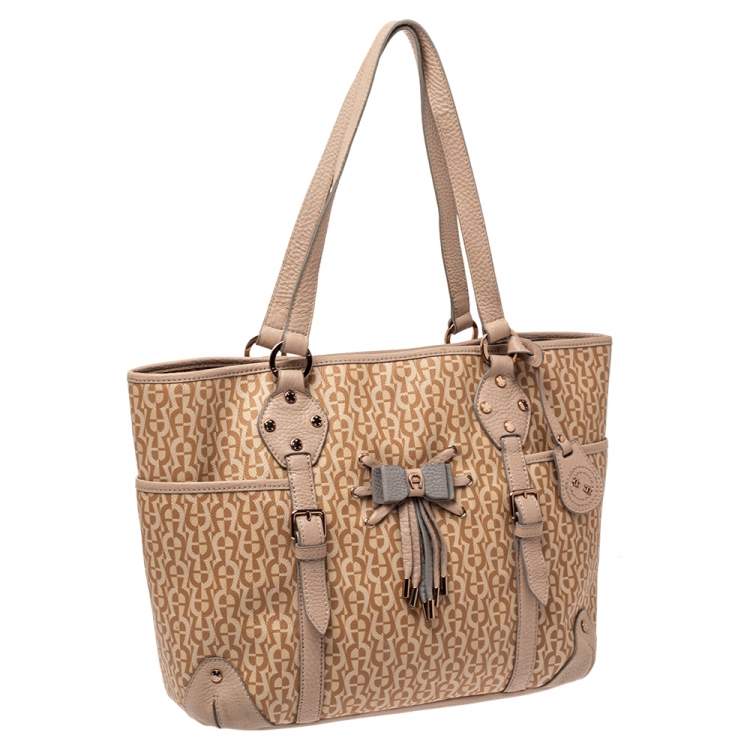 Pre Owned Aigner Beige/Pink Signature Coated Canvas and Leather Bow Tote