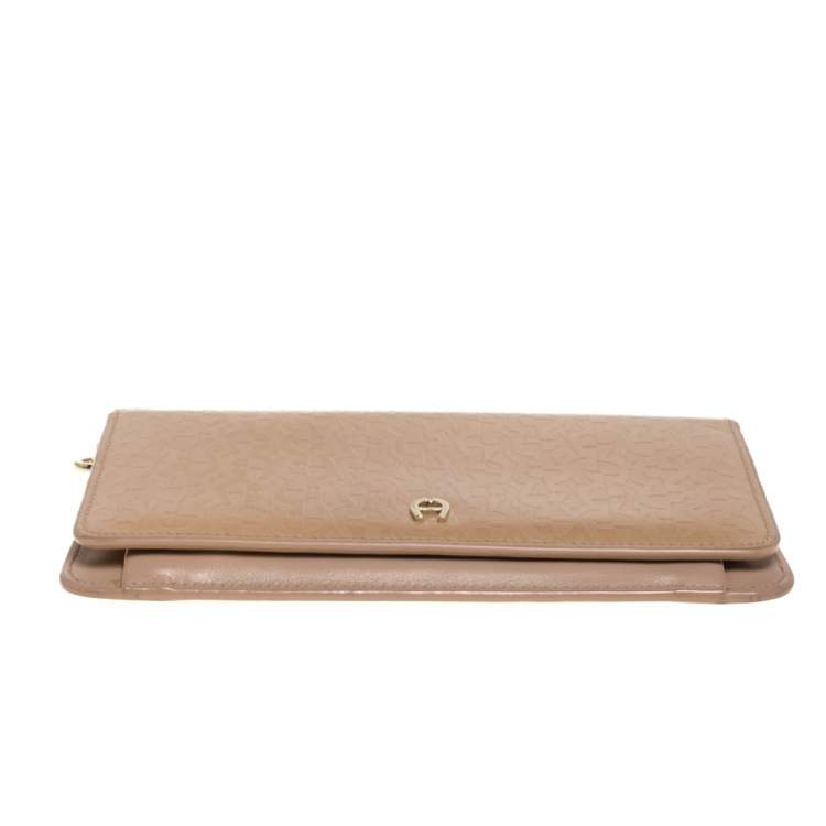 Pre Owned Aigner Beige Signature Embossed Patent Leather Flap Wristlet Wallet