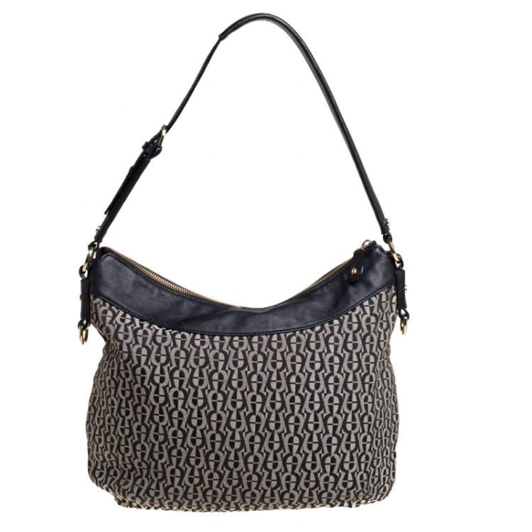 Pre Owned Aigner Black Signature Canvas and Leather Pocket Hobo