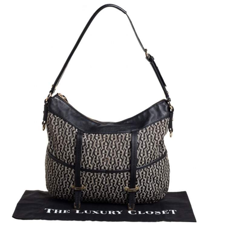 Pre Owned Aigner Black Signature Canvas and Leather Pocket Hobo