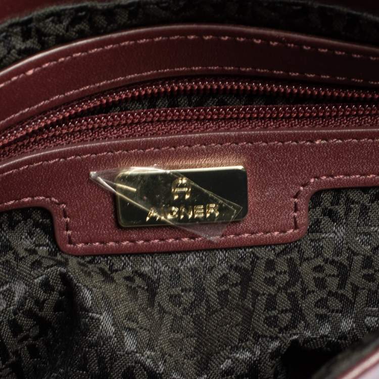 Pre Owned Aigner Burgundy Logo Embossed Leather Flap Crossbody Bag