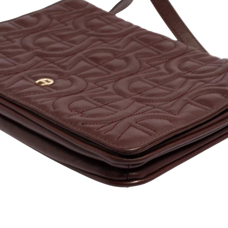 Pre Owned Aigner Burgundy Logo Embossed Leather Flap Crossbody Bag