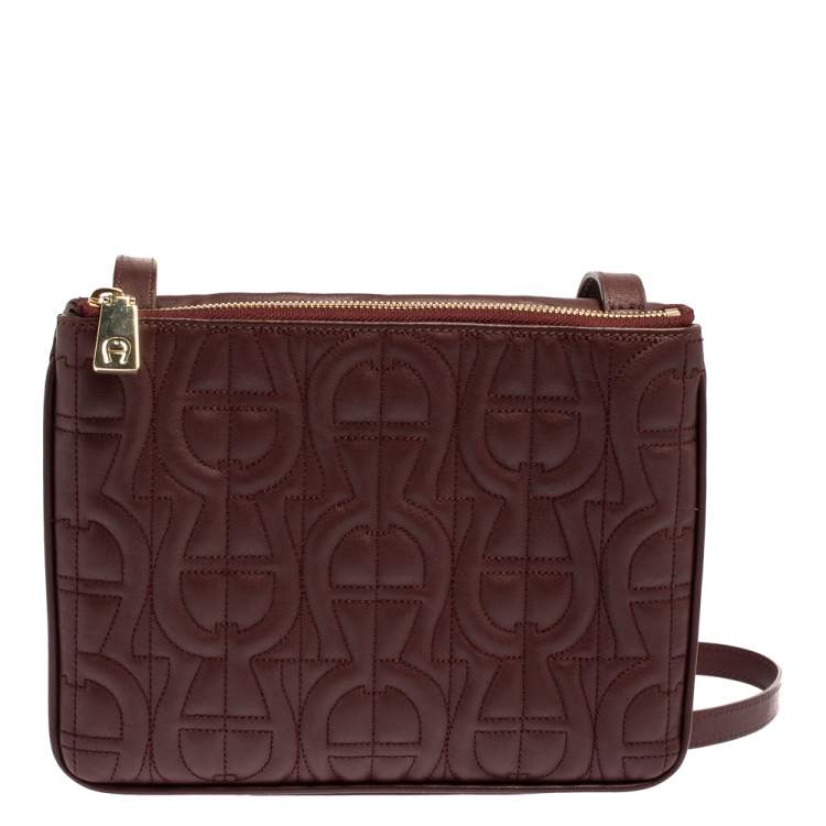 Pre Owned Aigner Burgundy Logo Embossed Leather Flap Crossbody Bag