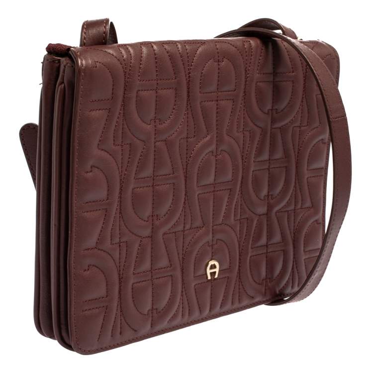 Pre Owned Aigner Burgundy Logo Embossed Leather Flap Crossbody Bag