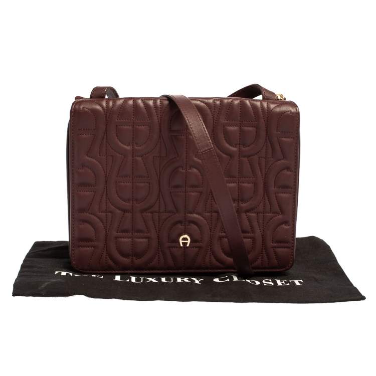 Pre Owned Aigner Burgundy Logo Embossed Leather Flap Crossbody Bag
