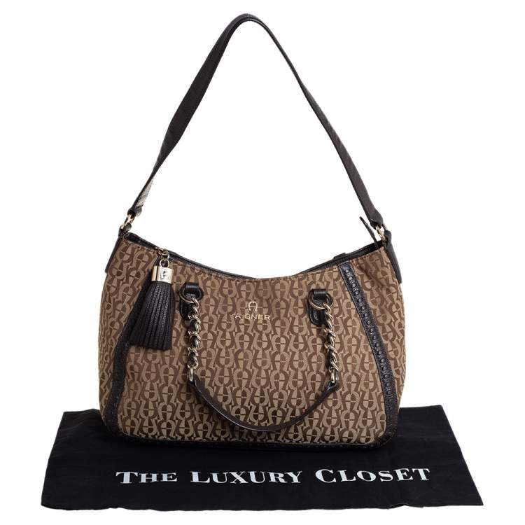 Pre Owned Aigner Brown/Beige Signature Canvas and Leather Tassel Shoulder Bag