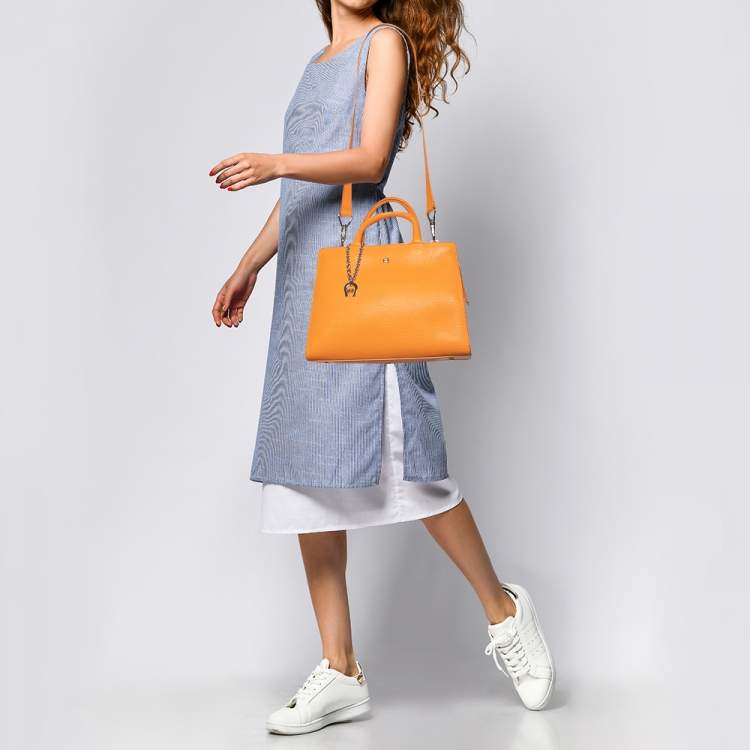 Pre Owned Aigner Orange Leather Cybill Tote
