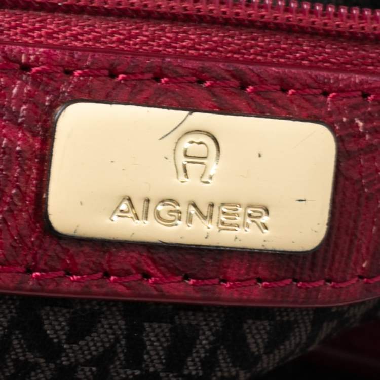 Pre Owned Aigner Fuchsia/Beige Signature Canvas and Textured Leather Zip Hobo