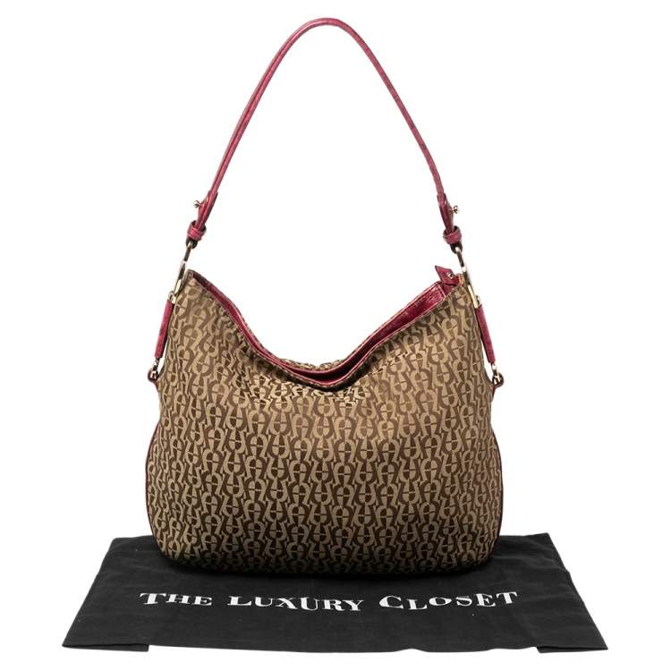Pre Owned Aigner Fuchsia/Beige Signature Canvas and Textured Leather Zip Hobo