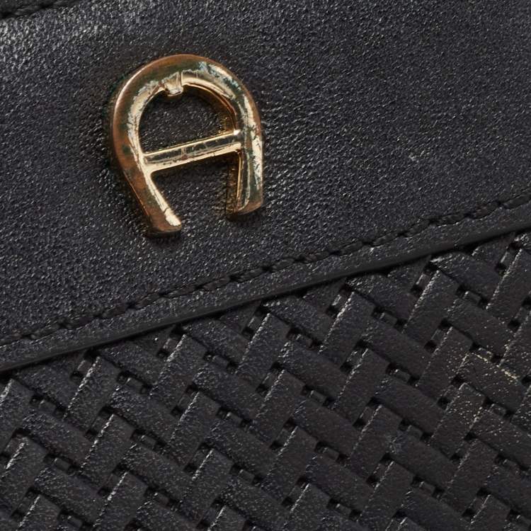 Pre Owned Aigner Black Woven Leather Cavallina Zip Around Continental Wallet