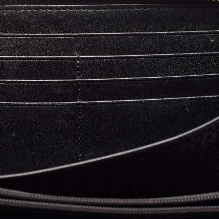 Pre Owned Aigner Black Woven Leather Cavallina Zip Around Continental Wallet