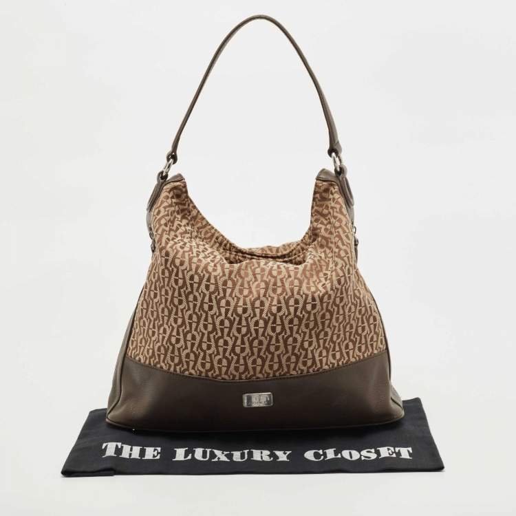 Pre Owned Aigner Beige/Brown Monogram Canvas and Leather Side Zip Hobo