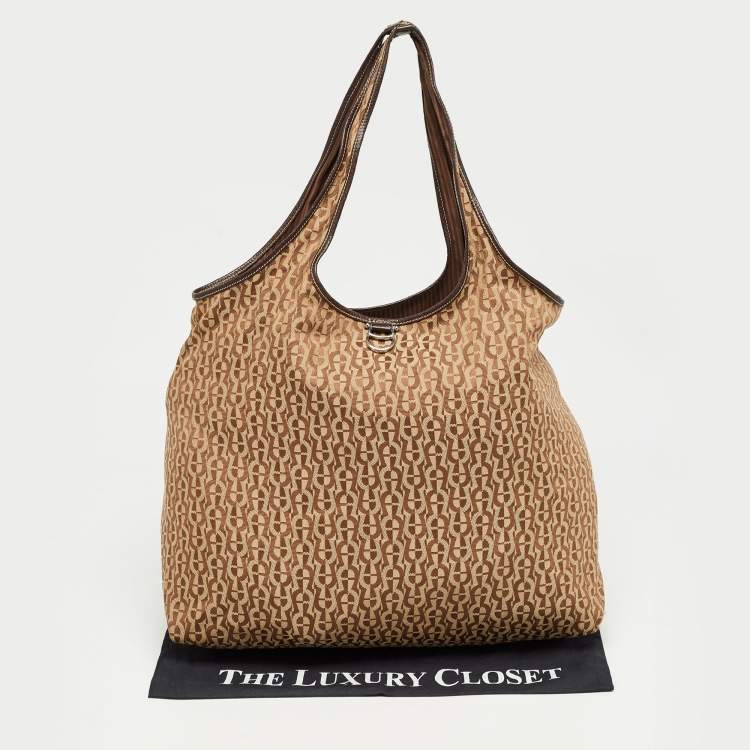 Pre Owned Aigner Brown Signature Canvas Travel Tote