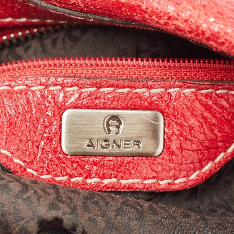 Pre Owned Aigner Red Shimer Leather Tassel Pocket Hobo