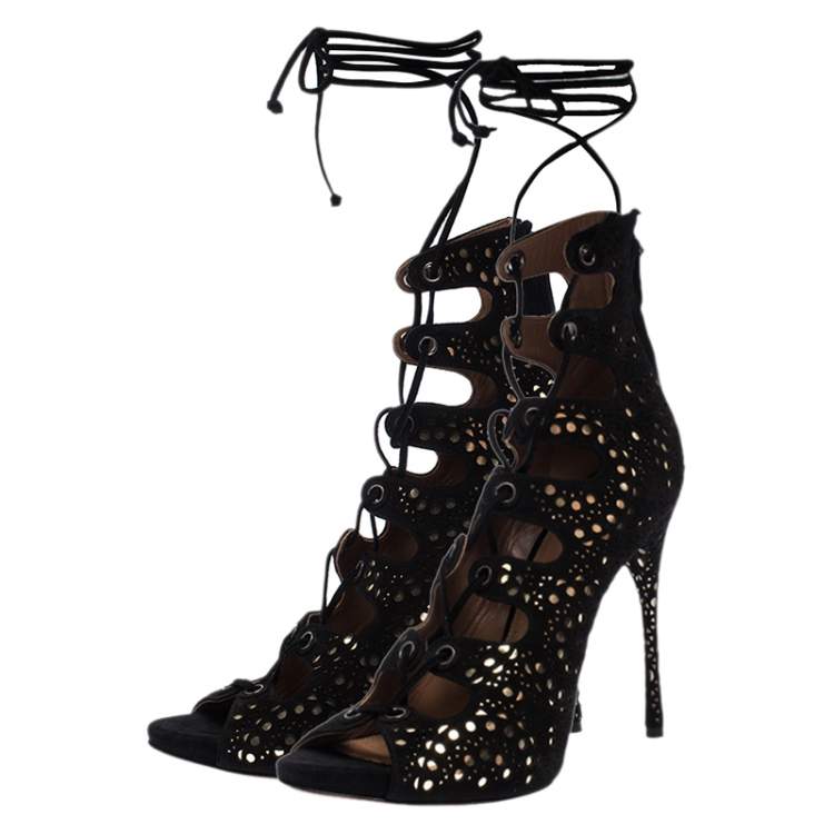مملوكة مسبقًا Alaia Black Laser Cut Suede And Metallic Gold Leather Gladiator Boot Sandals Size 37.5