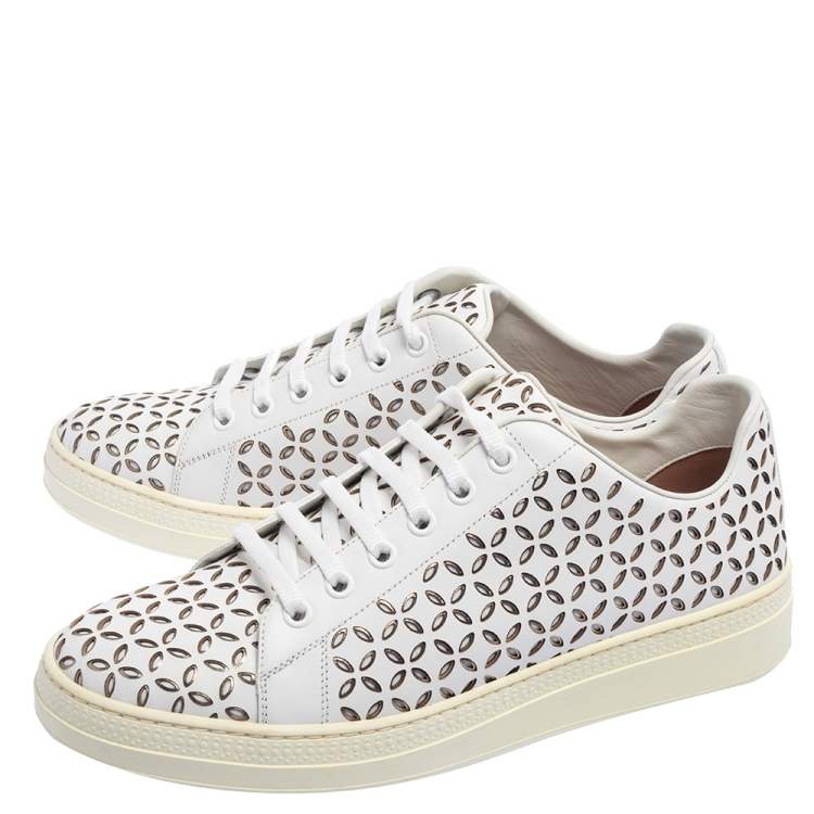 مملوكة مسبقًا Alaia White Laser Cut Leather Low Top Sneakers Size 40
