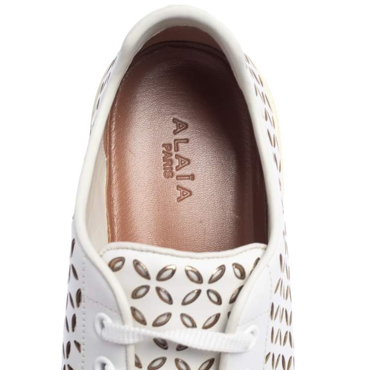 مملوكة مسبقًا Alaia White Laser Cut Leather Low Top Sneakers Size 40