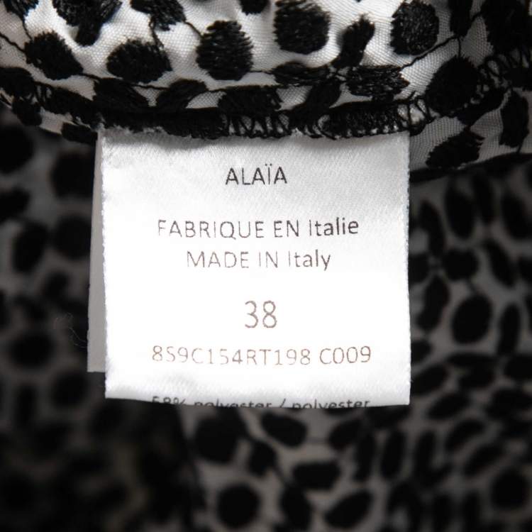 Pre Owned Alaia Black/White Embroidered Cotton Peplum Top M