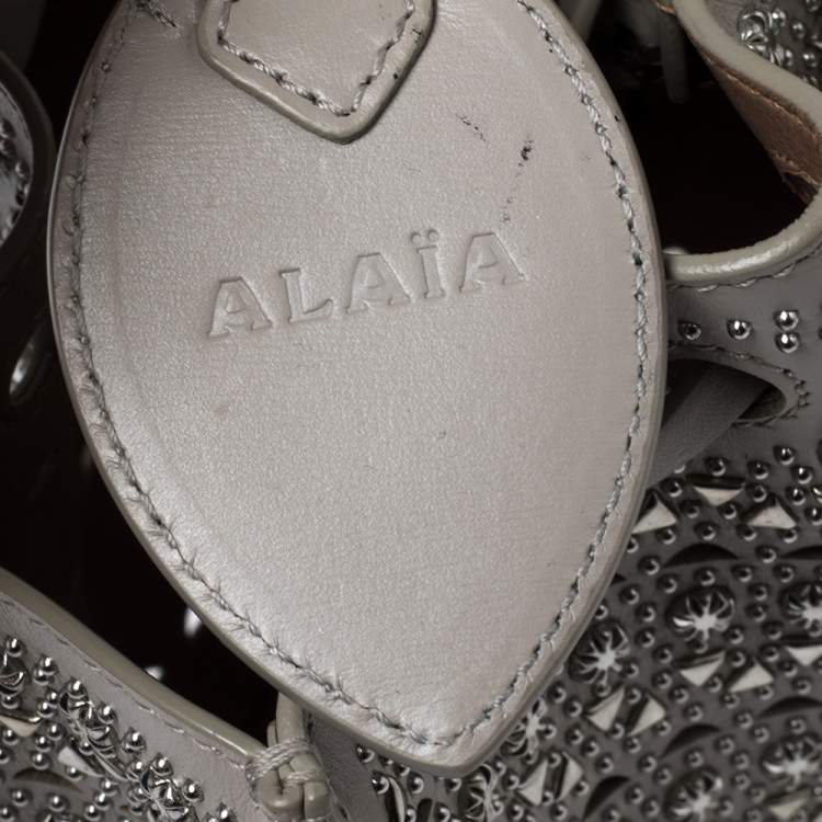Pre Owned Alaia Grey Leather Rose Marie Embellished Laser Cut Bucket Bag            