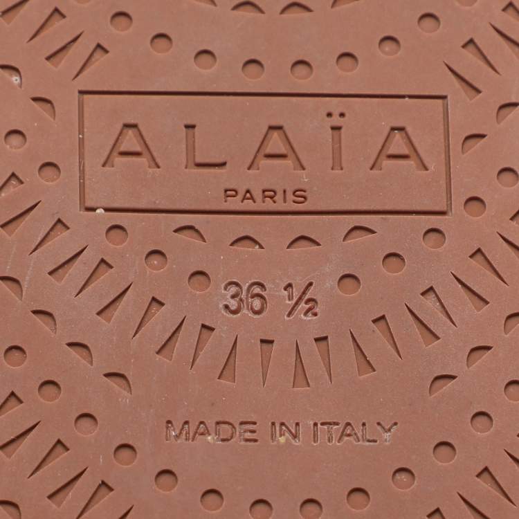 Pre Owned Alaia White Leather Grommet Flat Slides Size 36.5