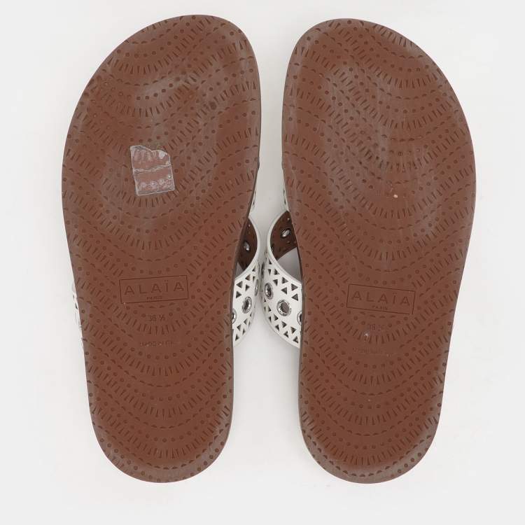 Pre Owned Alaia White Leather Grommet Flat Slides Size 36.5