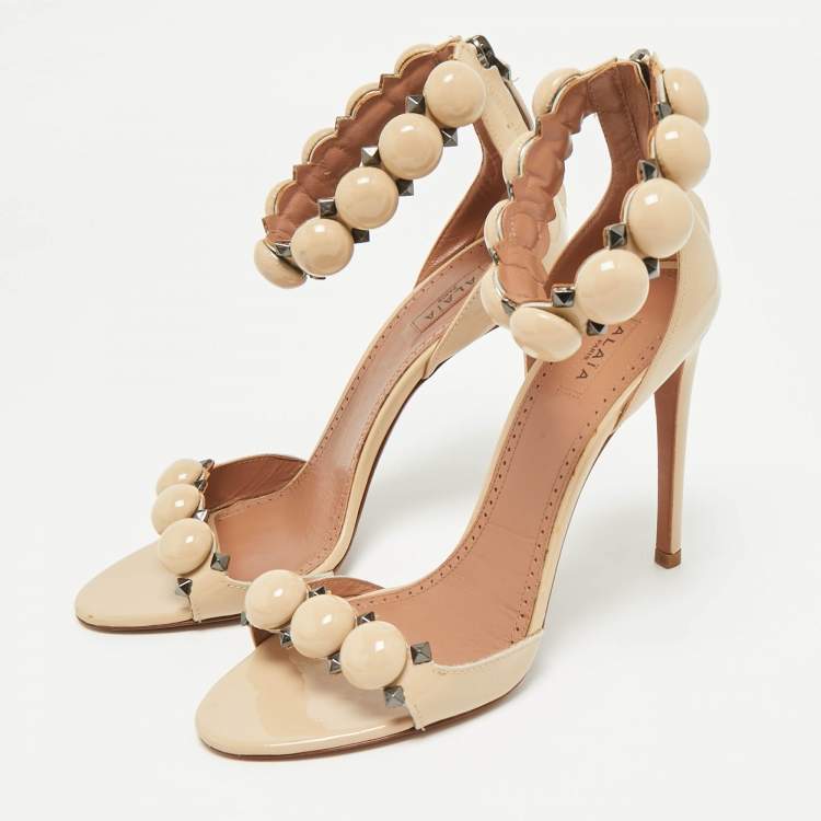 Pre Owned Alaia Beige Patent Leather Bombe Ankle Strap Sandals Size 38.5