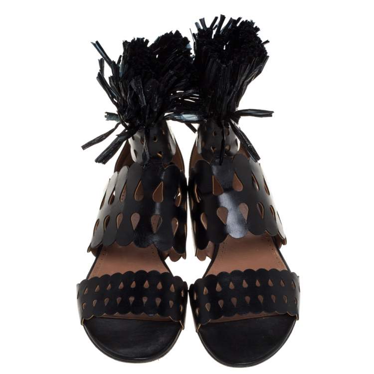 مملوكة مسبقًا Alaia Black Leather and Straw Cut Out Fringes Flat Sandals Size 39