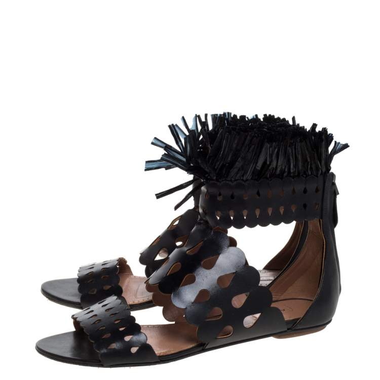 مملوكة مسبقًا Alaia Black Leather and Straw Cut Out Fringes Flat Sandals Size 39