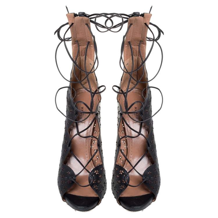 مملوكة مسبقًا Alaia Black Laser Cut Leather Gladiator Ankle Wrap Sandals Size 37