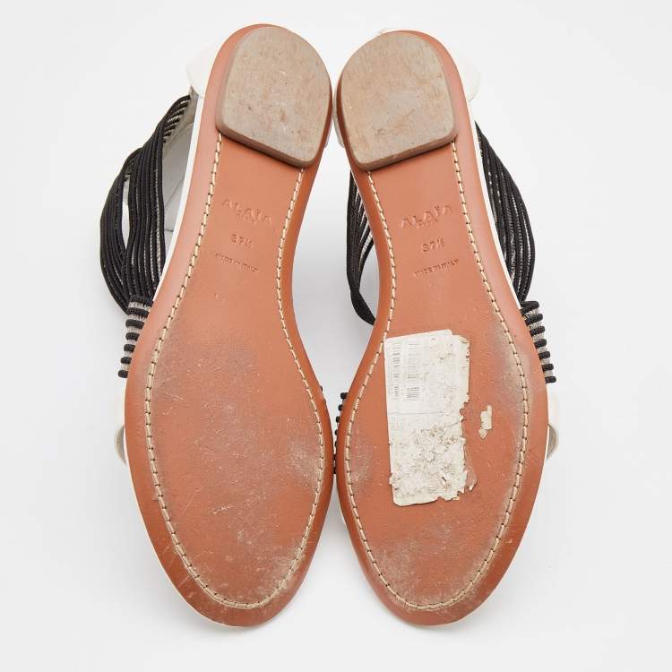 Pre Owned Alaia White/Black Leather and Stretch Fabric Ankle Strap Flats Size 37.5