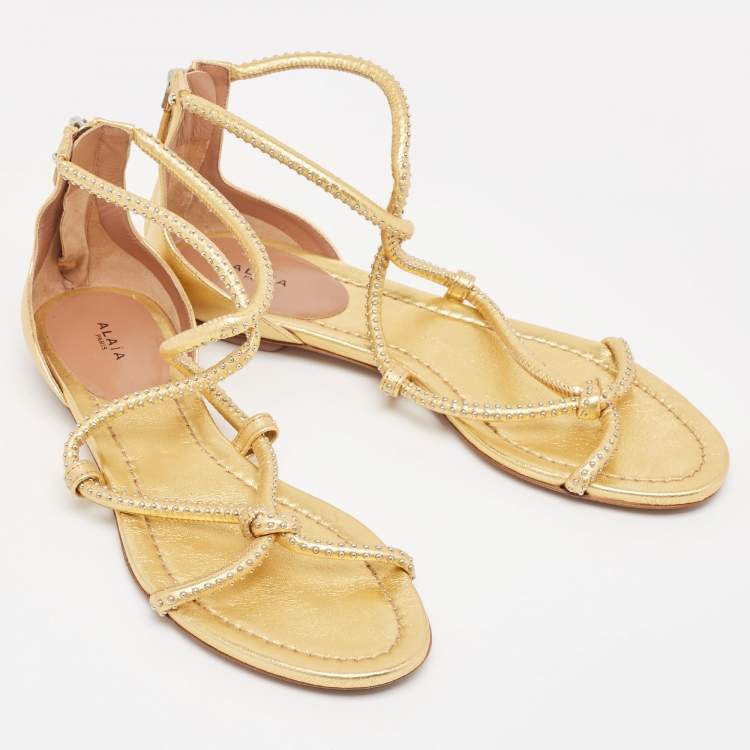 Pre Owned Alaia Gold Studded Leather Strappy Flat Sandals Size 38.5