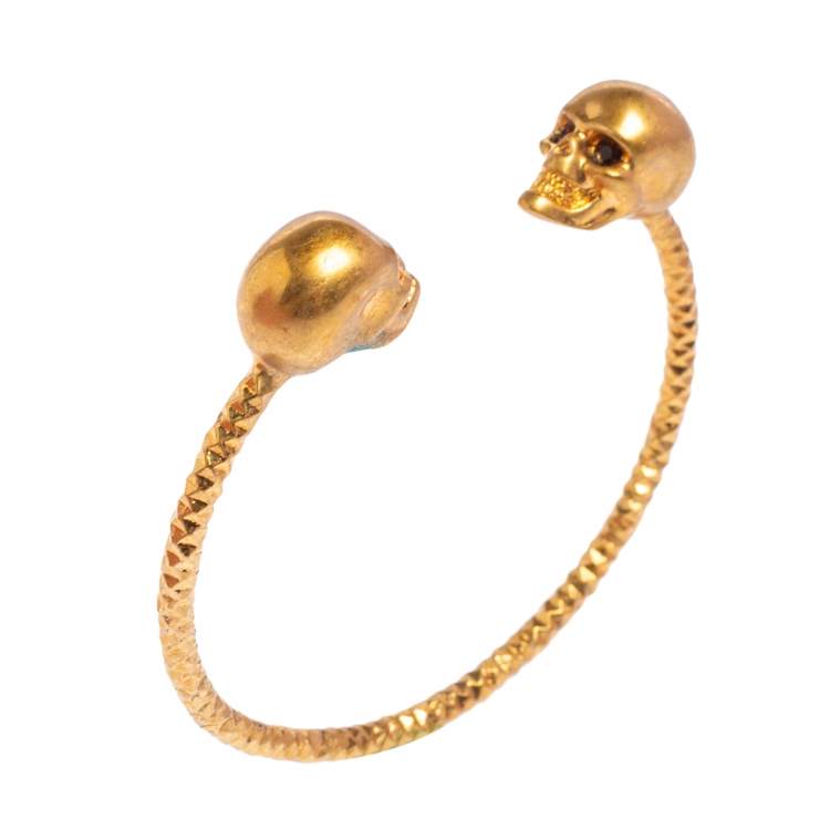 Pre Owned Alexander McQueen Twin Skull Gold Tone Open Cuff Bracelet 