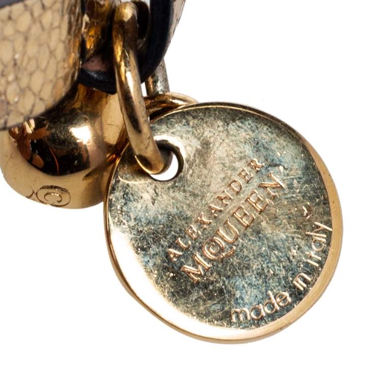 Pre Owned Alexander McQueen Gold Foil Print Snakeskin Double Wrap Skull Charm Bracelet