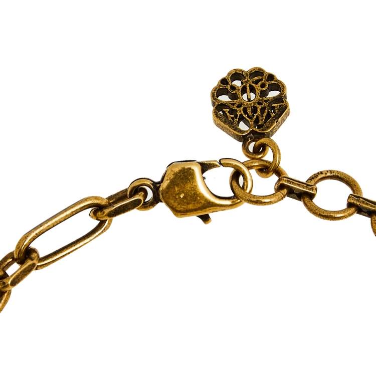 Pre Owned Alexander McQueen Antique Gold Tone Chain Bracelet & Egg Charm Set