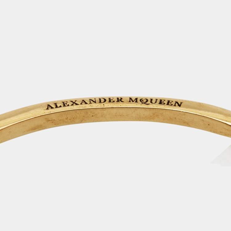 مملوكة مسبقًا Alexander McQueen Gold Tone Skull Cuff Bracelet