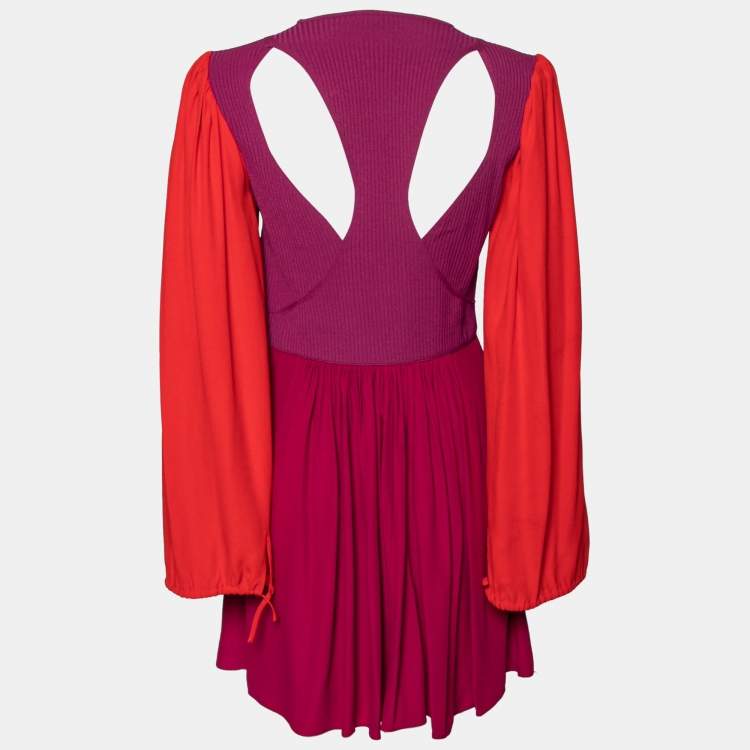 Pre Owned Alexander McQueen Purple and Red Knit Cut Out Detail Bell Sleeve Dress M