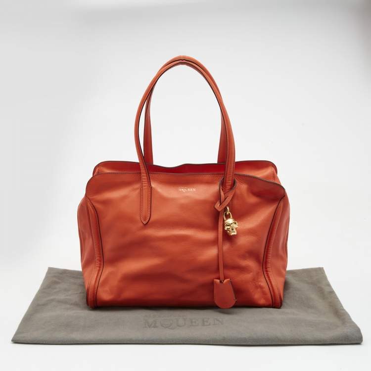 Pre Owned Alexander Mcqueen Orange Leather Large Skull Padlock Tote