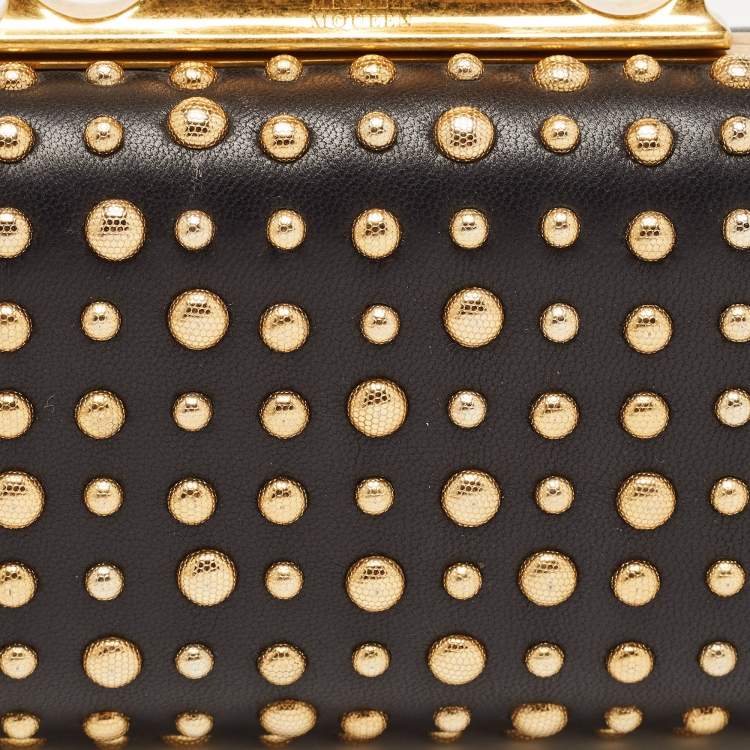Pre Owned Alexander McQueen Black/Gold Leather Studded Four Ring Knuckle Clutch 