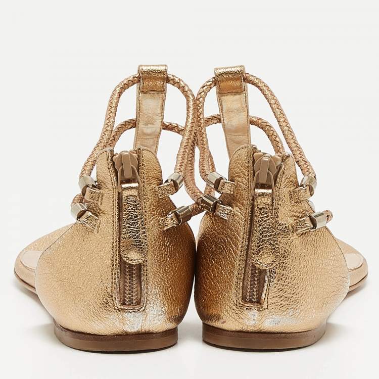 Pre Owned Alexander McQueen Gold Braided Leather Skull Detail Thong Flat Sandals Size 41