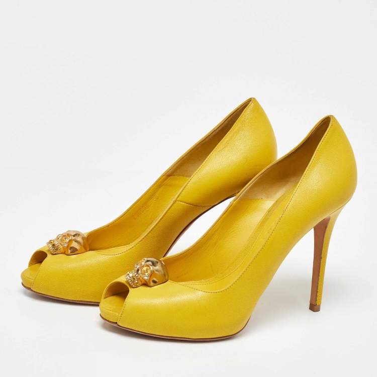 Pre Owned Alexander McQueen Yellow Leather Embellished Skull Peep Toe Pumps Size 38