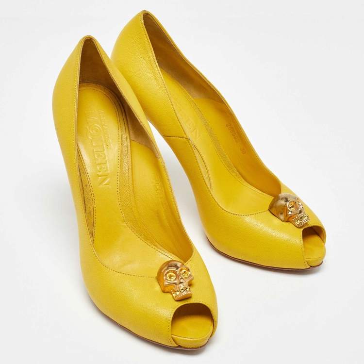 Pre Owned Alexander McQueen Yellow Leather Embellished Skull Peep Toe Pumps Size 38